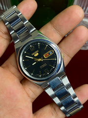 Seiko 5 Automatic — Numeral Black Dial Watch with Exhibition Back | Ref 7S26-00X0