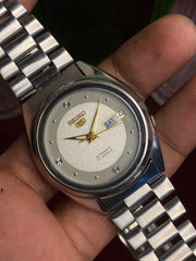 Seiko 5 “Frost & Ash” — 7009 Textured Two-Tone Automatic watch.