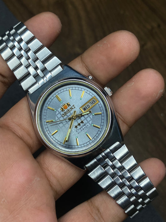 Super Rare Orient Tri-Star Crystal Silver Sunburst Checkered Pattern Dial Watch.