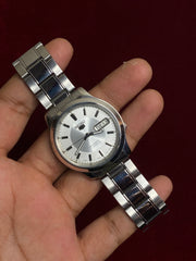 Seiko 5 SNK789 — Silver Sunburst Dial | Ref. 7S26-06F2 | Exhibition Caseback | 38mm