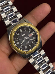 Vintage Seiko 5 Automatic — Black Textured Dial, Gold-Tone Bezel | Ref. 7009-6031 | 38mm.