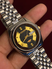 Citizen Eagle 7 Automatic — Black & Gold Motif Dial Watch.