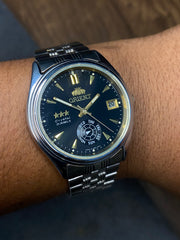Rare Orient Tri-Star Black Dial Watch. Unique day pointer” sub-dial located at the 6 o’clock.
