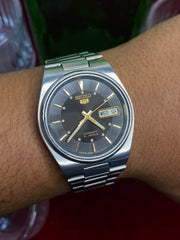 Seiko 5 Automatic — Black "Wave" Dial watch with Exhibition Back | Ref 7S26-0480.