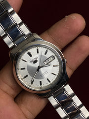 Seiko 5 SNK789 — Silver Sunburst Dial | Ref. 7S26-06F2 | Exhibition Caseback | 38mm