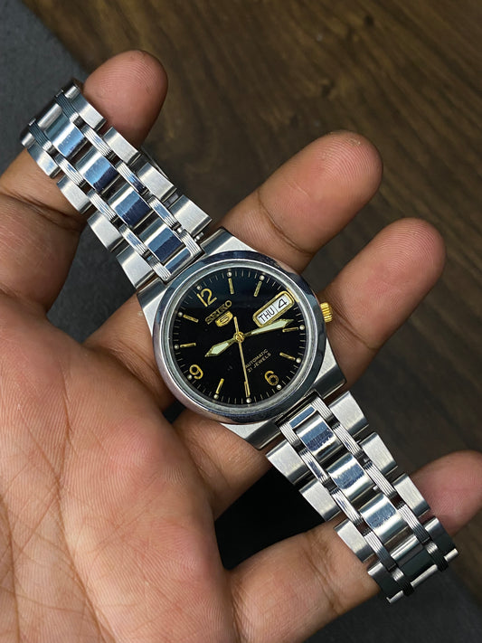 Unique Seiko 5 “Explorer” Black Dial Watch with 6-9-12 Numeric & See-Through Back