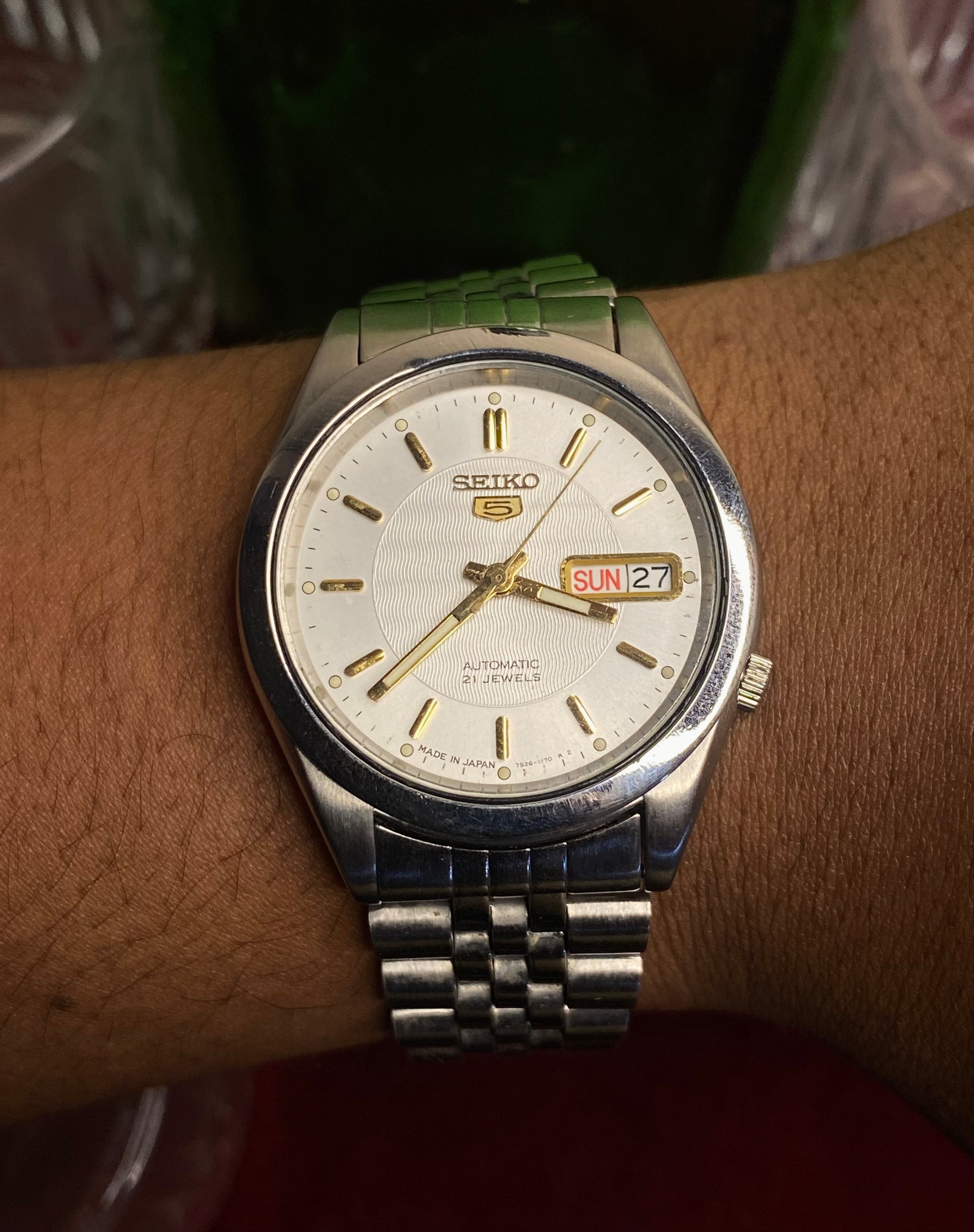 Seiko 5 Automatic — White Wave-Textured Dial watch with Exhibition Back | Ref 7S26-00X0