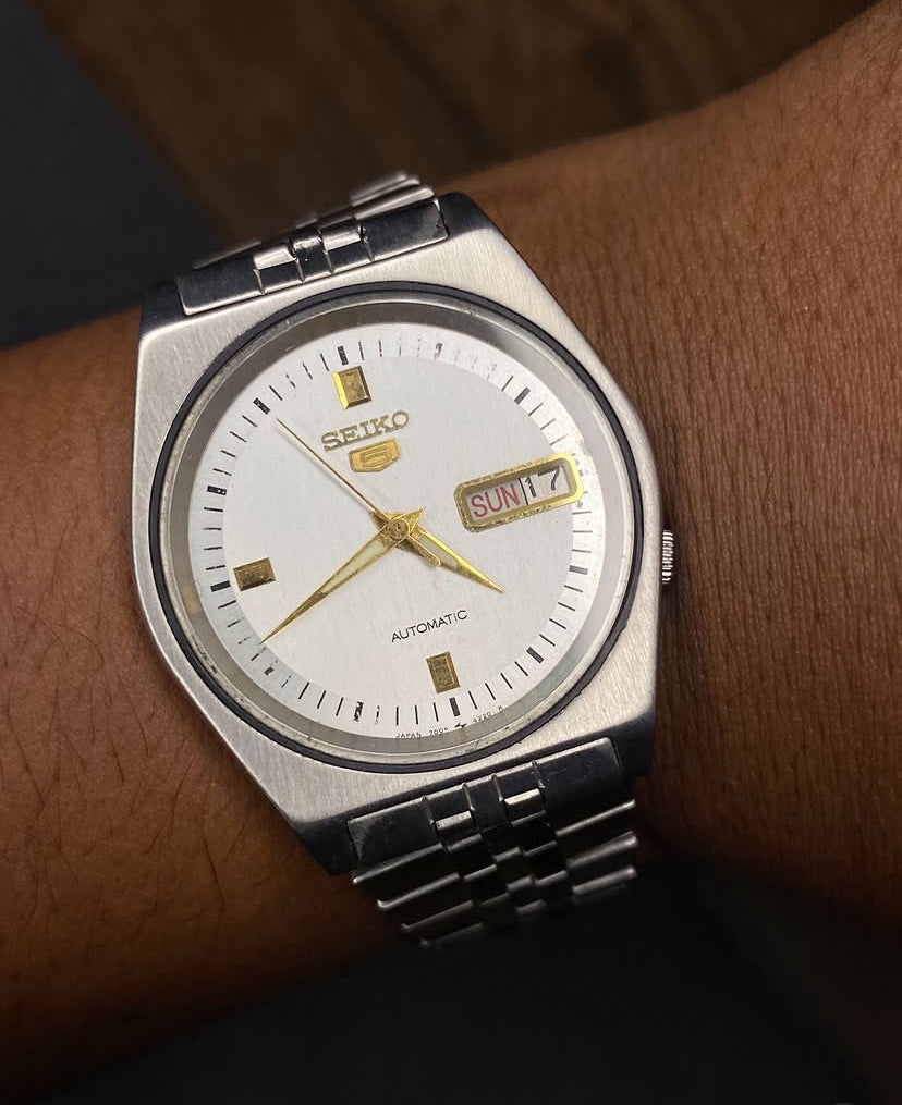Seiko 5 “Warm Ivory” — 7009 Gold-Accent Automatic watch.