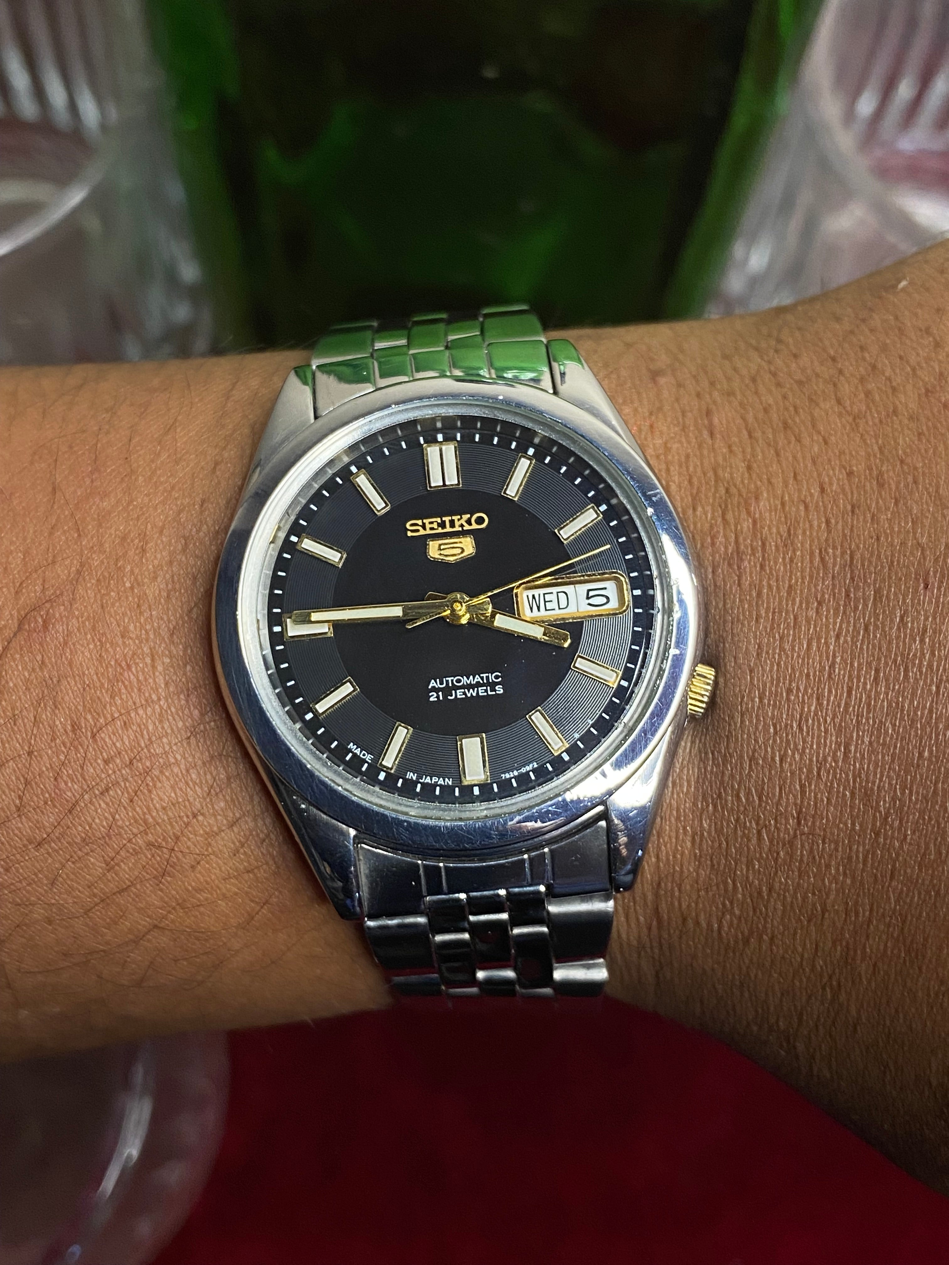 Seiko 5 SNKF67J1 Automatic — Black Sunburst Dial Watch with Exhibition Back | Ref 7S26-00X0.