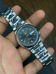 Seiko 5 — Dark Grey Sunburst Dial | 36mm Automatic with Exhibition Back Watch.