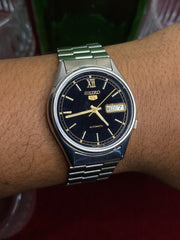 Vintage Seiko 5 — Black & Gold Roman XII Dial (36mm, 1980s ).