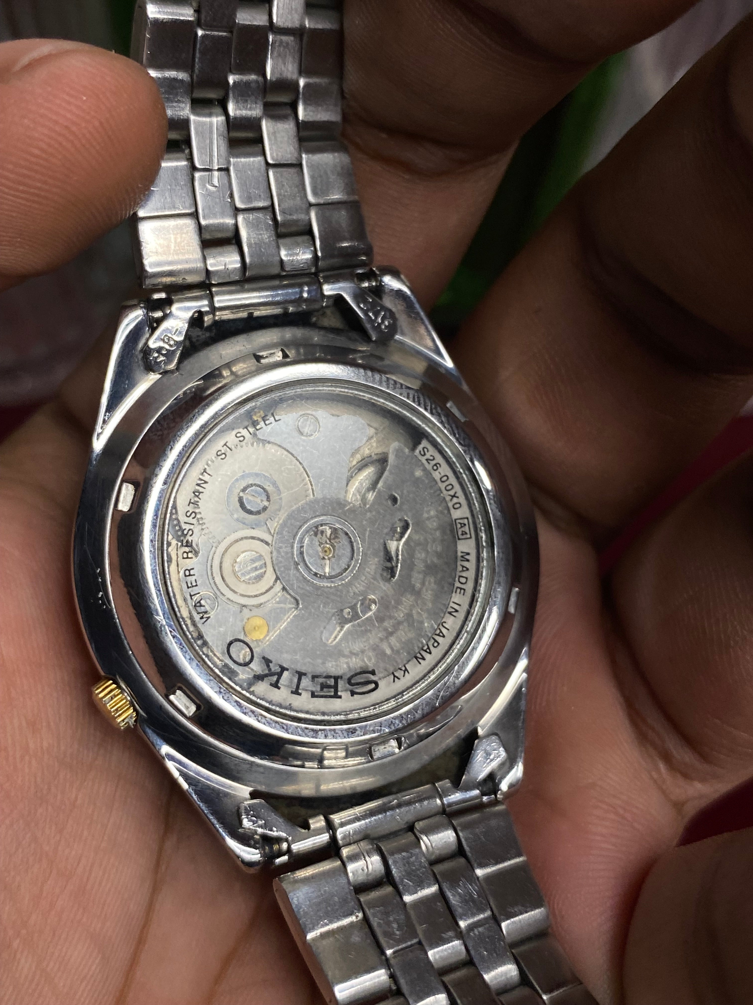 Seiko 5 SNKF67J1 Automatic — Black Sunburst Dial Watch with Exhibition Back | Ref 7S26-00X0.