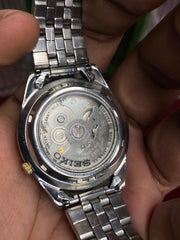 Seiko 5 SNKF67J1 Automatic — Black Sunburst Dial Watch with Exhibition Back | Ref 7S26-00X0.