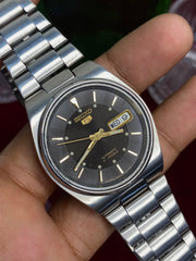 Seiko 5 Automatic — Black "Wave" Dial watch with Exhibition Back | Ref 7S26-0480.