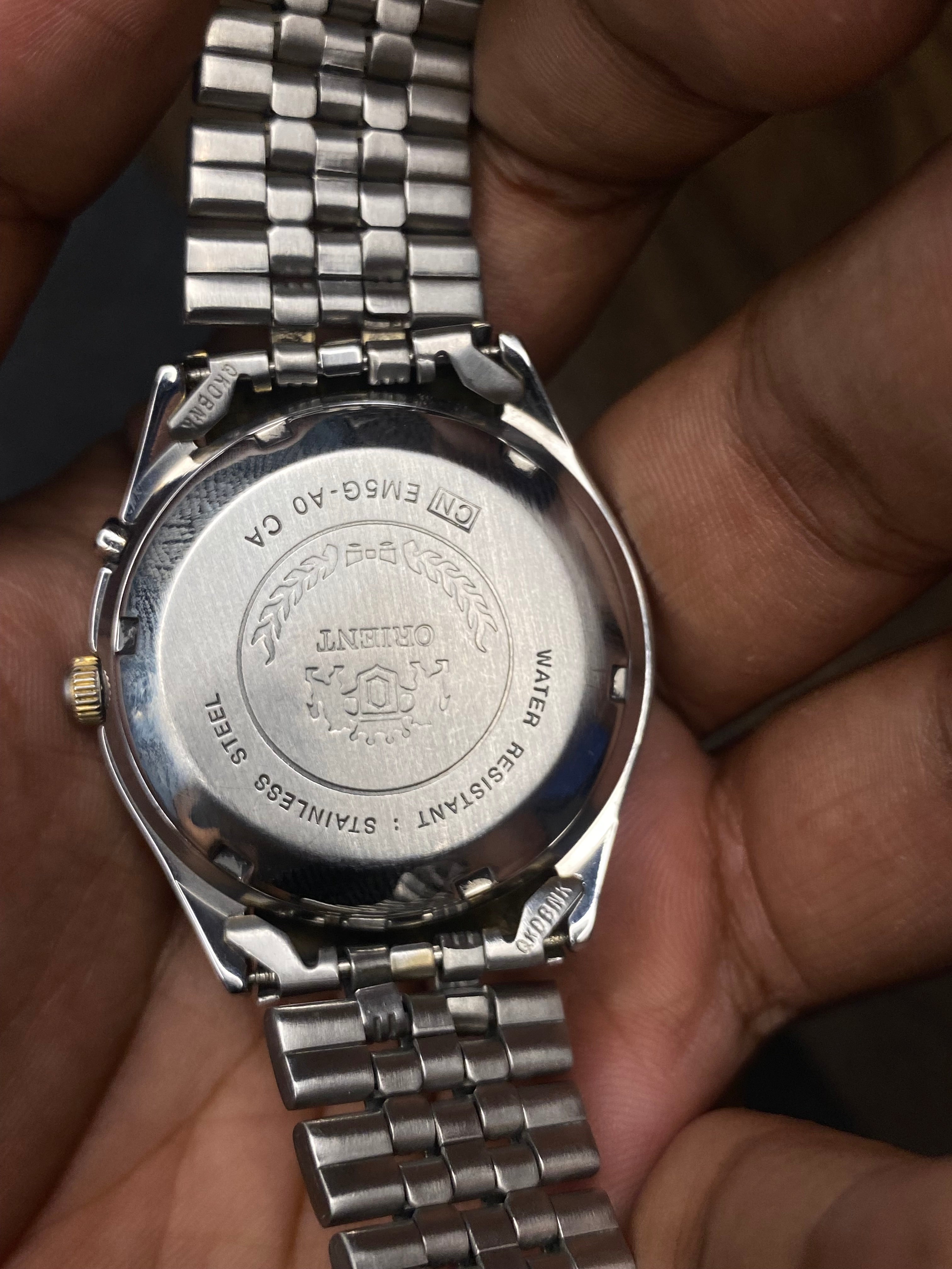 Rare Orient Tri-Star Black Dial Watch. Unique day pointer” sub-dial located at the 6 o’clock.
