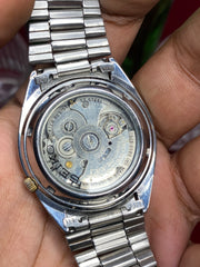 Seiko 5 “Gold Standard” — 7S26 Champagne Dial Exhibition Automatic watch.