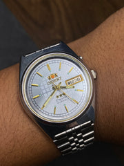 Orient Tri-Star — Silver Sunburst Checkered Dial | 37mm Japanese Automatic Watch.
