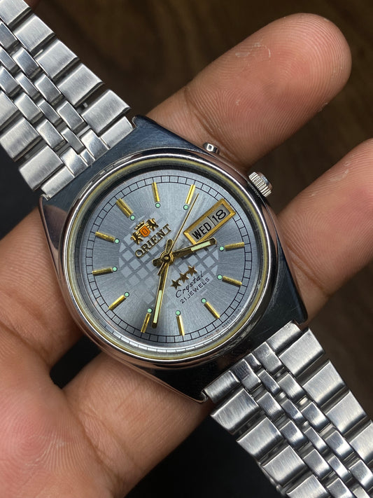Super Rare Orient Tri-Star Crystal Silver Sunburst Checkered Pattern Dial Watch.