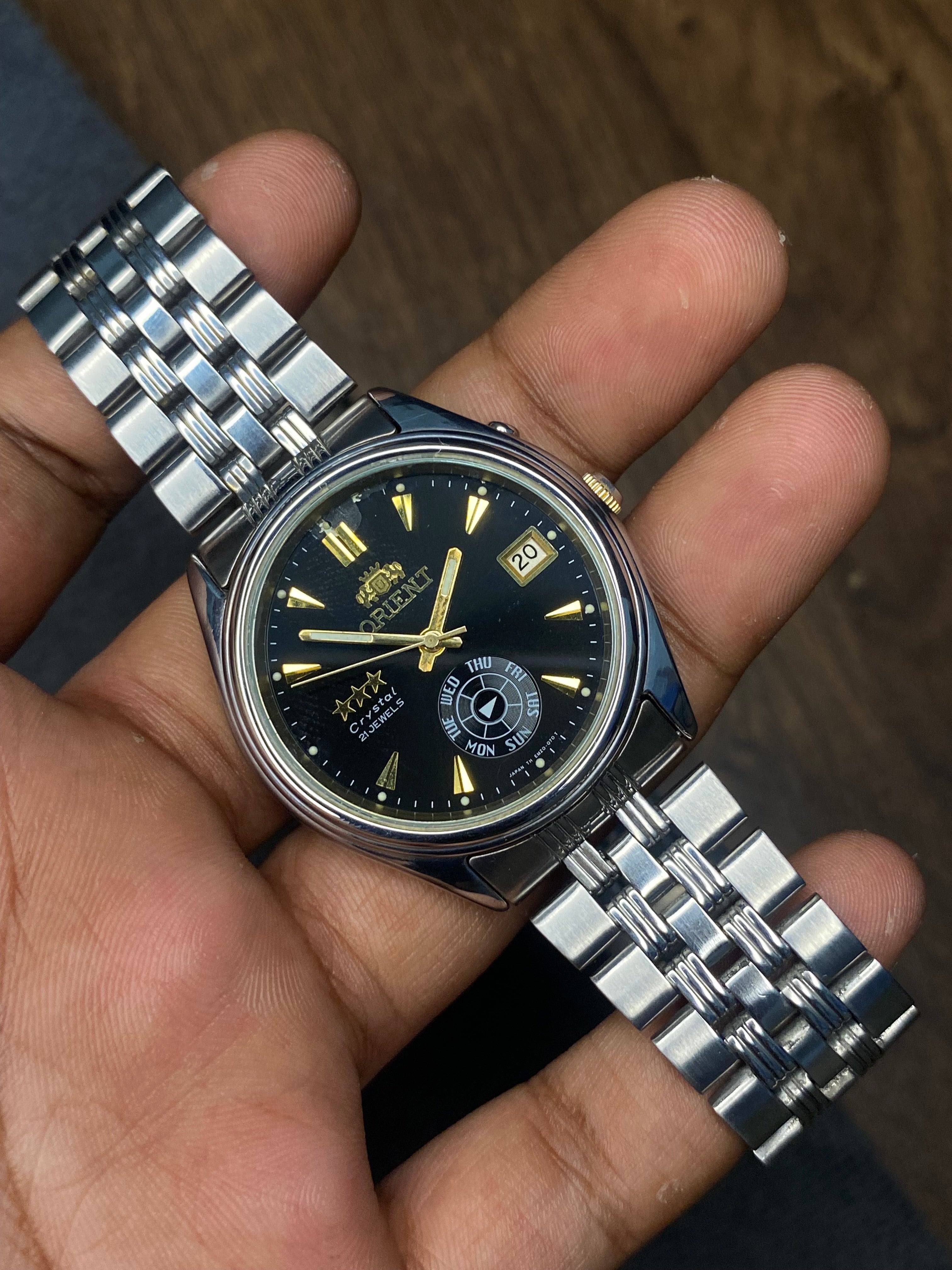 Rare Orient Tri-Star Black Dial Watch. Unique day pointer” sub-dial located at the 6 o’clock.