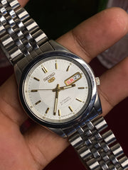 Seiko 5 Automatic — White Wave-Textured Dial watch with Exhibition Back | Ref 7S26-00X0