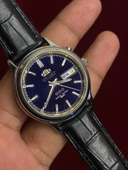 Orient 3-Star Automatic — Blue Sunburst Dial, Gold Chapter Ring | Ref. EM68-C0 | 38mm.