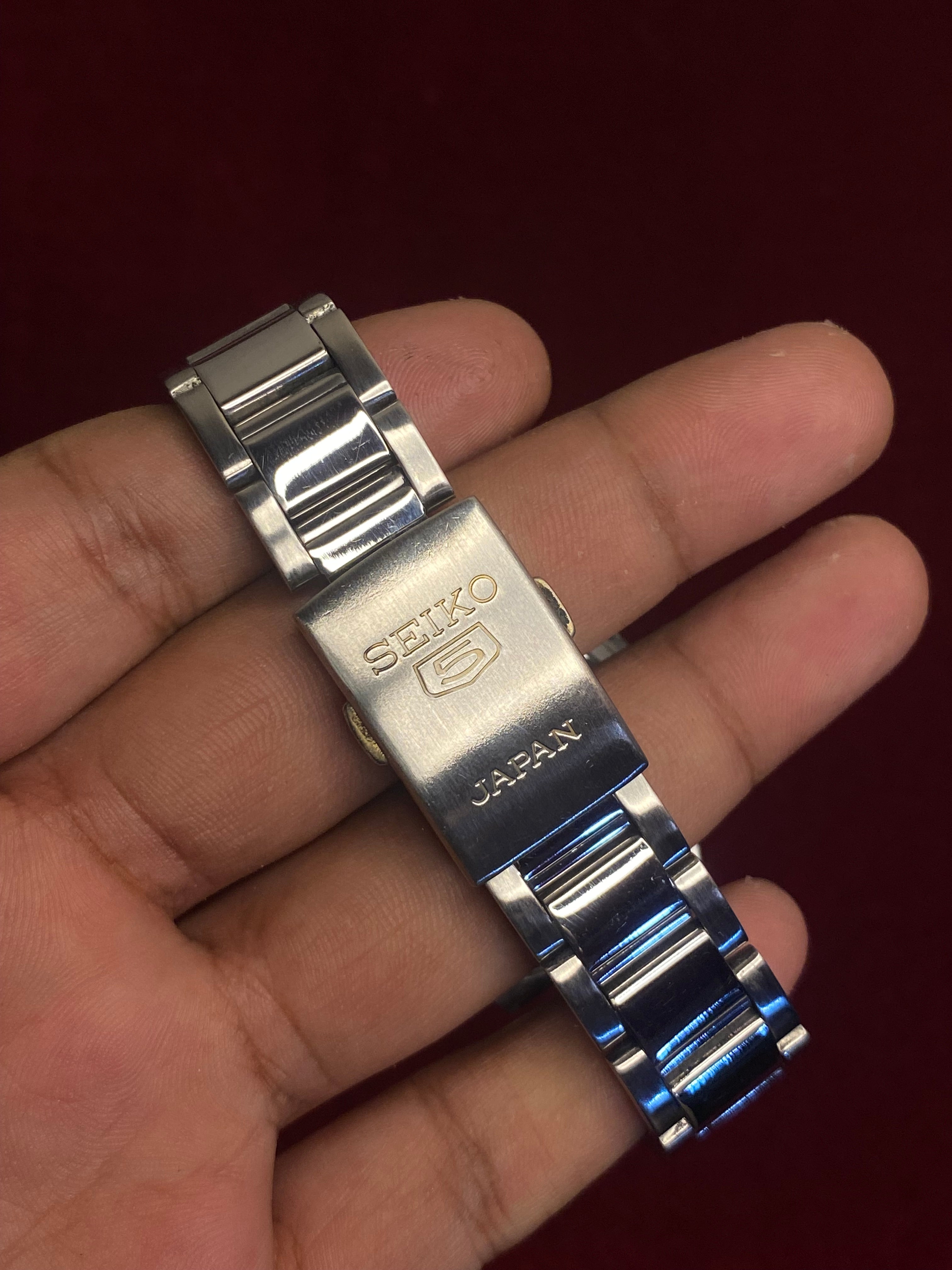 Seiko 5 SNKC55J1 — Black Dial, Red Seconds, Exhibition Caseback | Ref- 7S26-02P0.
