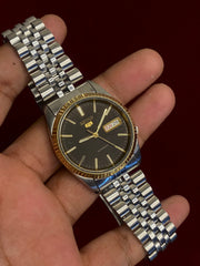 Seiko 5 "President" — Grey Dial, Fluted Gold Bezel | Ref. 7009-6001.