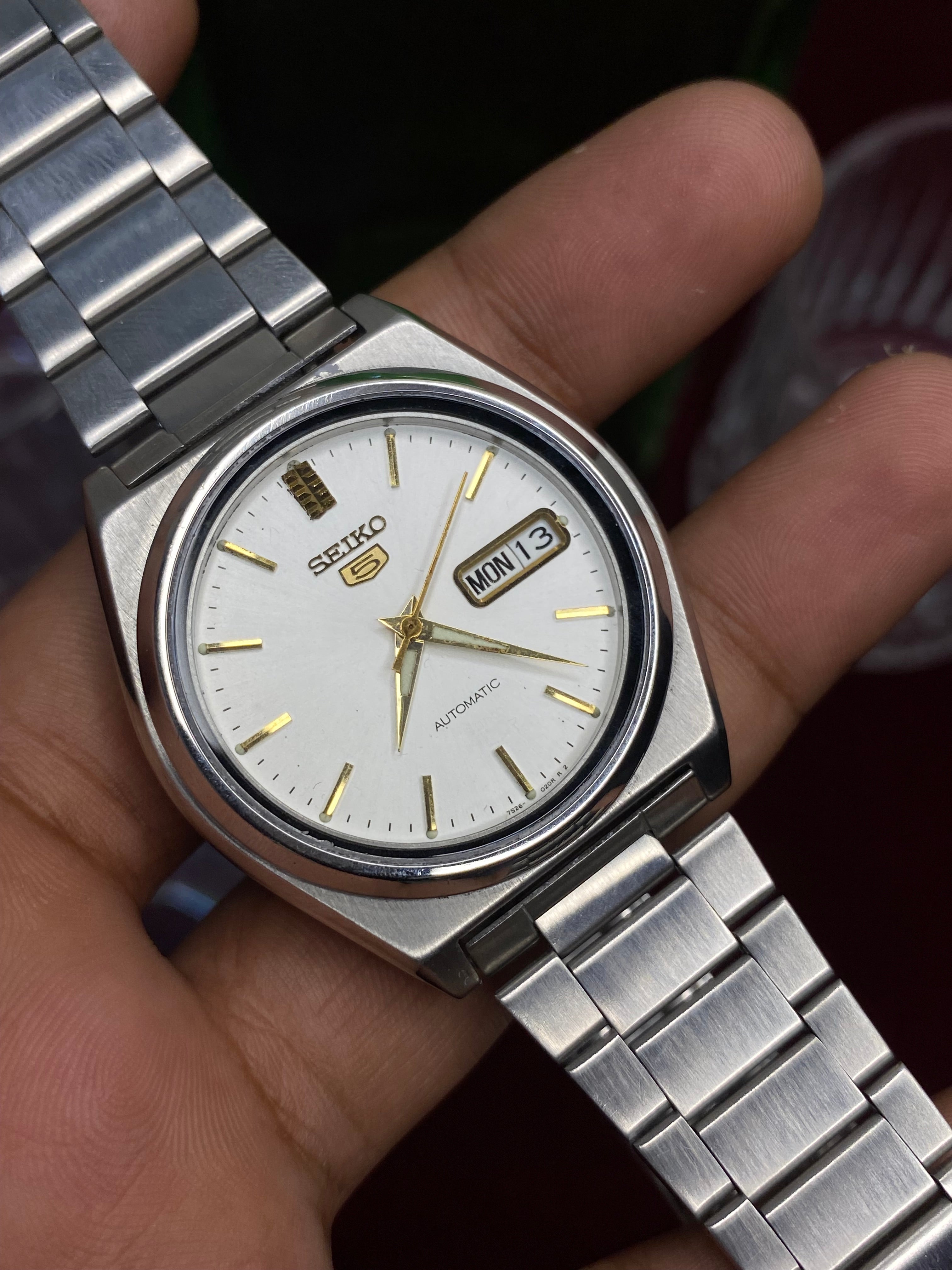 Seiko 5 “Clean Slate” — 7S26 White Dial Exhibition Automatic watch.
