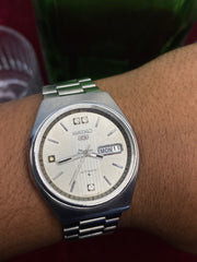 Seiko 5 — Silver Striped Dial with Crystal Accents | 38mm Japanese Automatic Watch.
