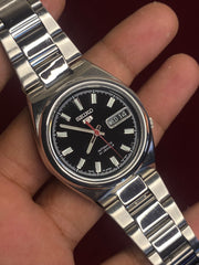 Seiko 5 SNKC55J1 — Black Dial, Red Seconds, Exhibition Caseback | Ref- 7S26-02P0.