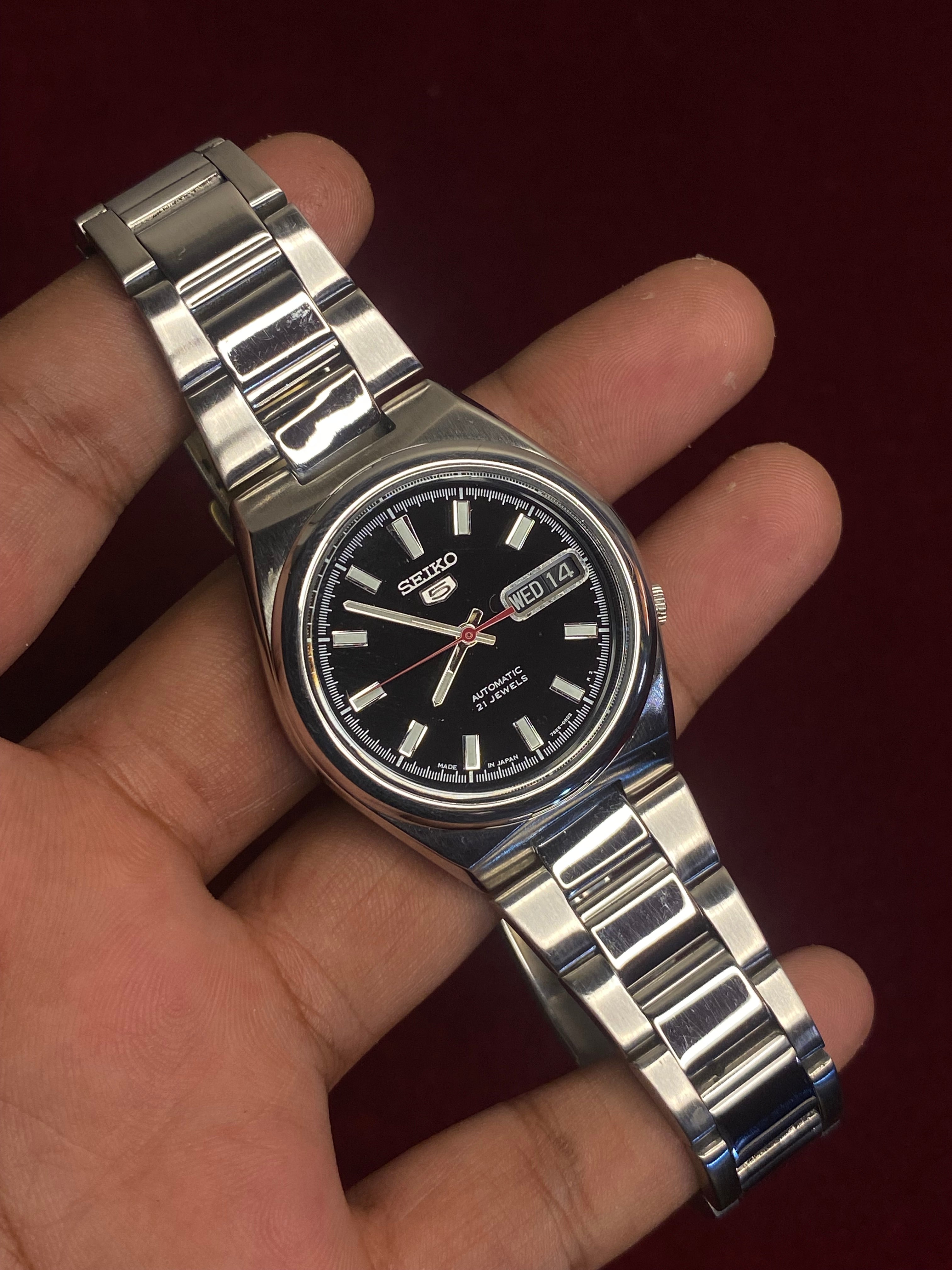 Seiko 5 SNKC55J1 — Black Dial, Red Seconds, Exhibition Caseback | Ref- 7S26-02P0.