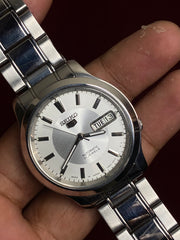 Seiko 5 SNK789 — Silver Sunburst Dial | Ref. 7S26-06F2 | Exhibition Caseback | 38mm