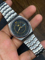 Seiko 5 — Matte Black & Gold Circle Dial | 38mm Japanese Automatic Watch.
