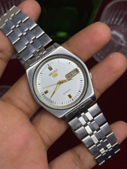 Seiko 5 “Warm Ivory” — 7009 Gold-Accent Automatic watch.