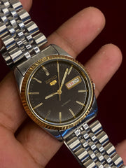 Seiko 5 "President" — Grey Dial, Fluted Gold Bezel | Ref. 7009-6001.