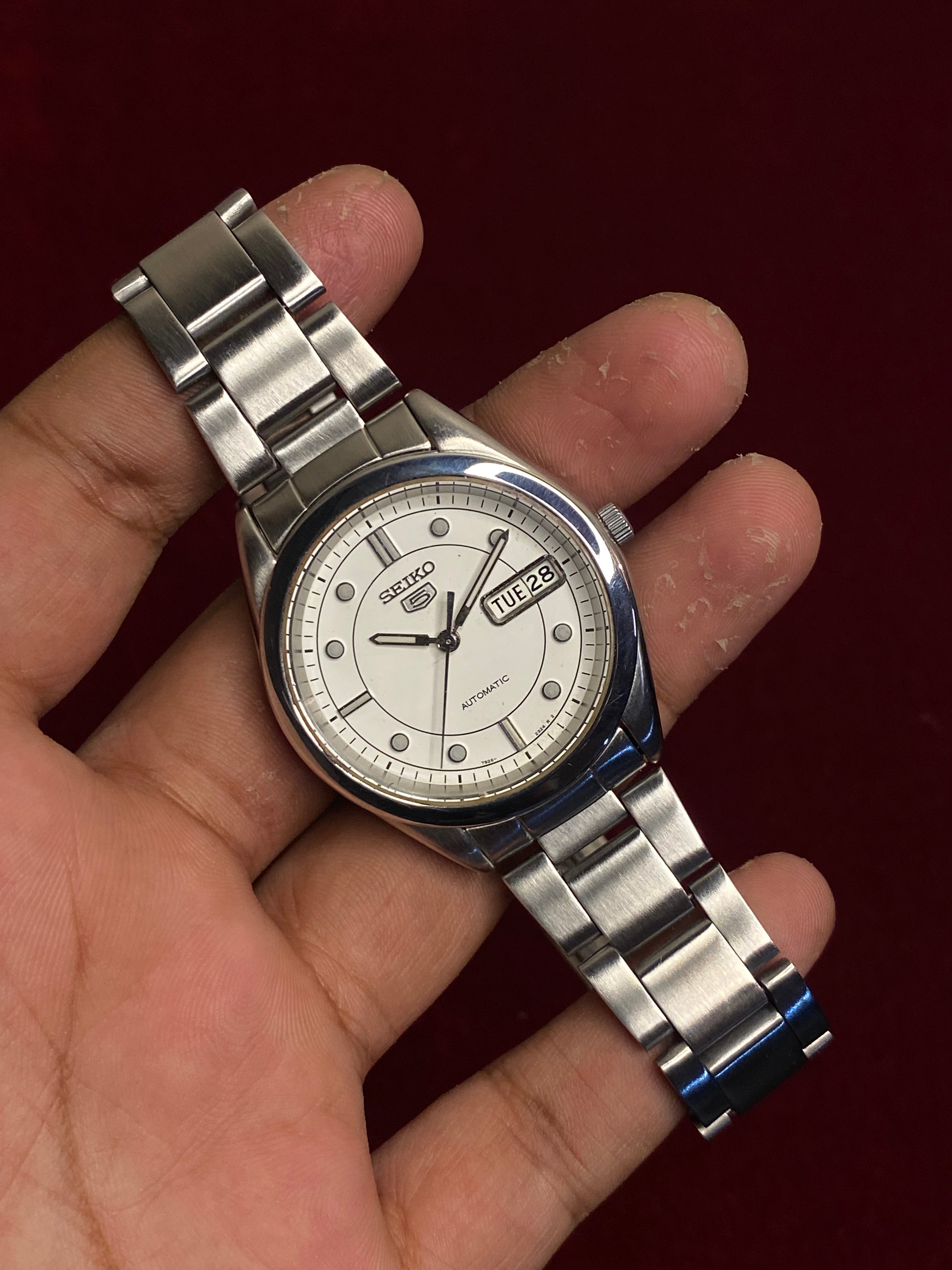 Seiko 5 SNX999 Automatic — White Dial with Concentric Ring Layout | Ref. 7S26-00X0 | Exhibition Caseback | 38mm