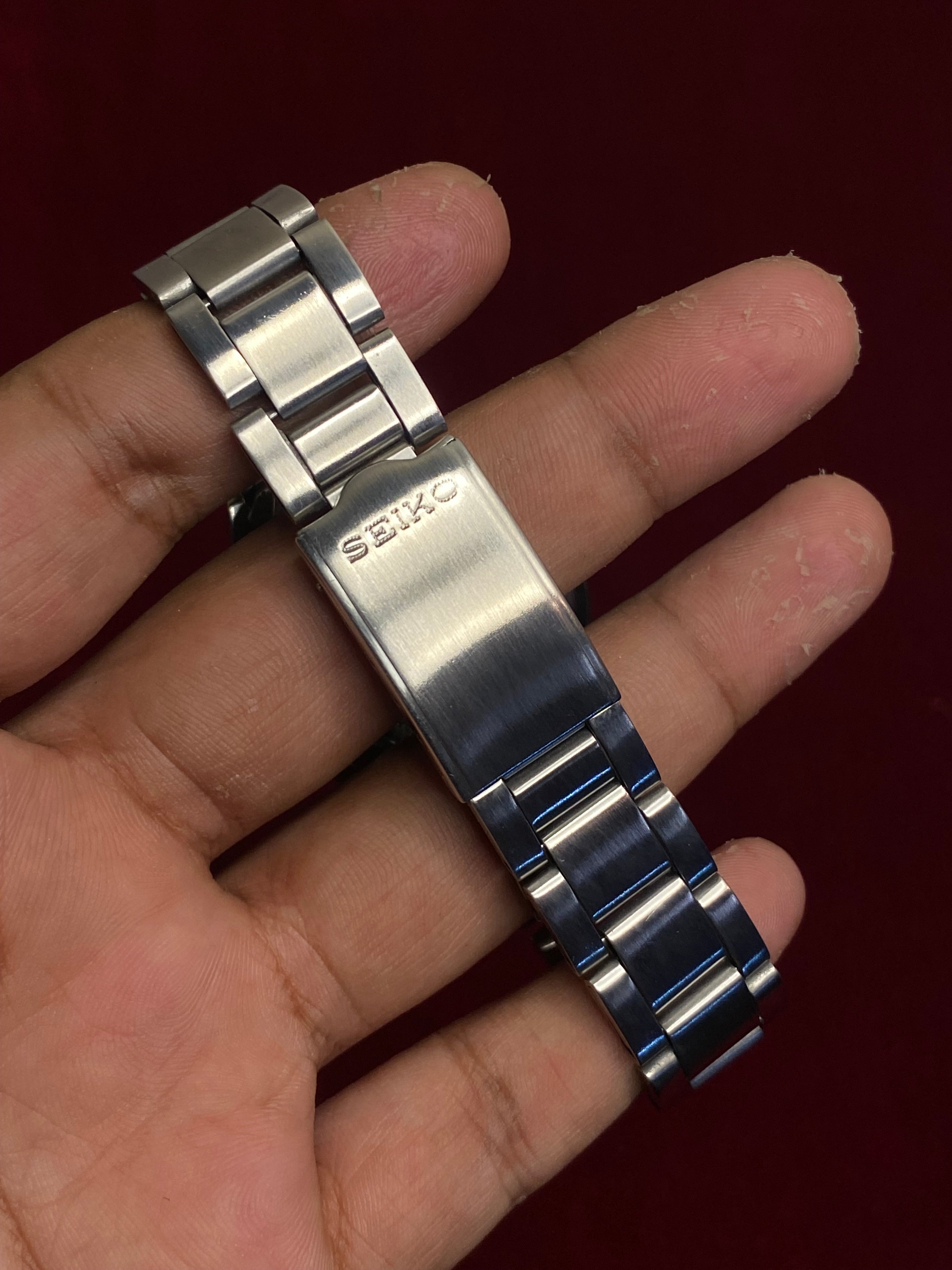 Seiko 5 SNX999 Automatic — White Dial with Concentric Ring Layout | Ref. 7S26-00X0 | Exhibition Caseback | 38mm