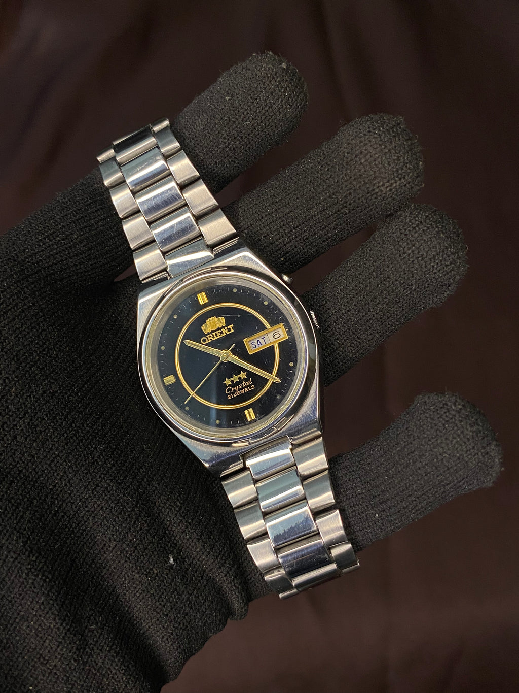Orient Tri-Star Crystal Black Dial Watch with Golden Ring