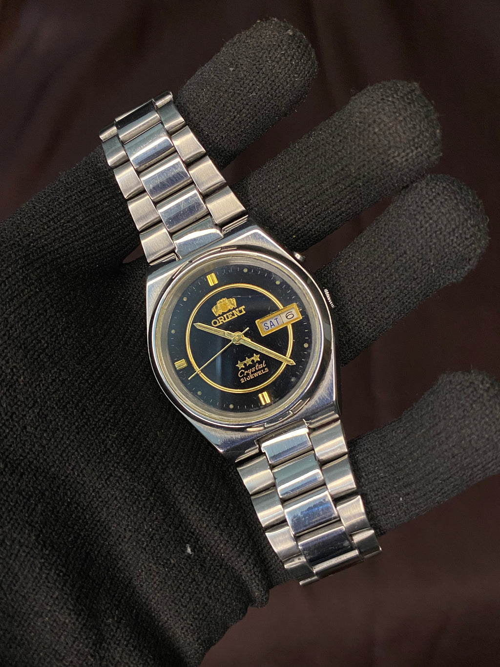 Orient Tri-Star Crystal Black Dial Watch with Golden Ring