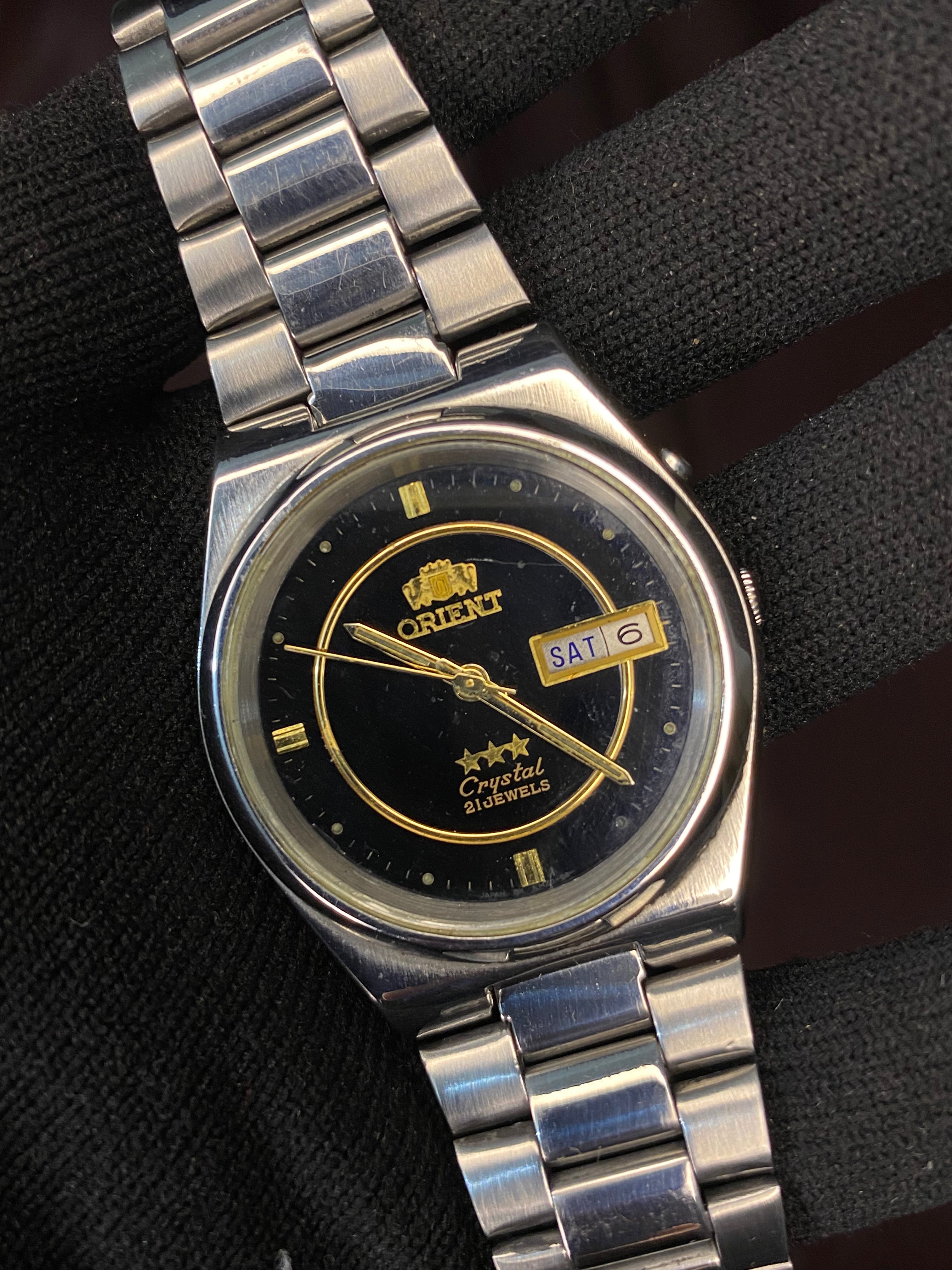 Orient Tri-Star Crystal Black Dial Watch with Golden Ring