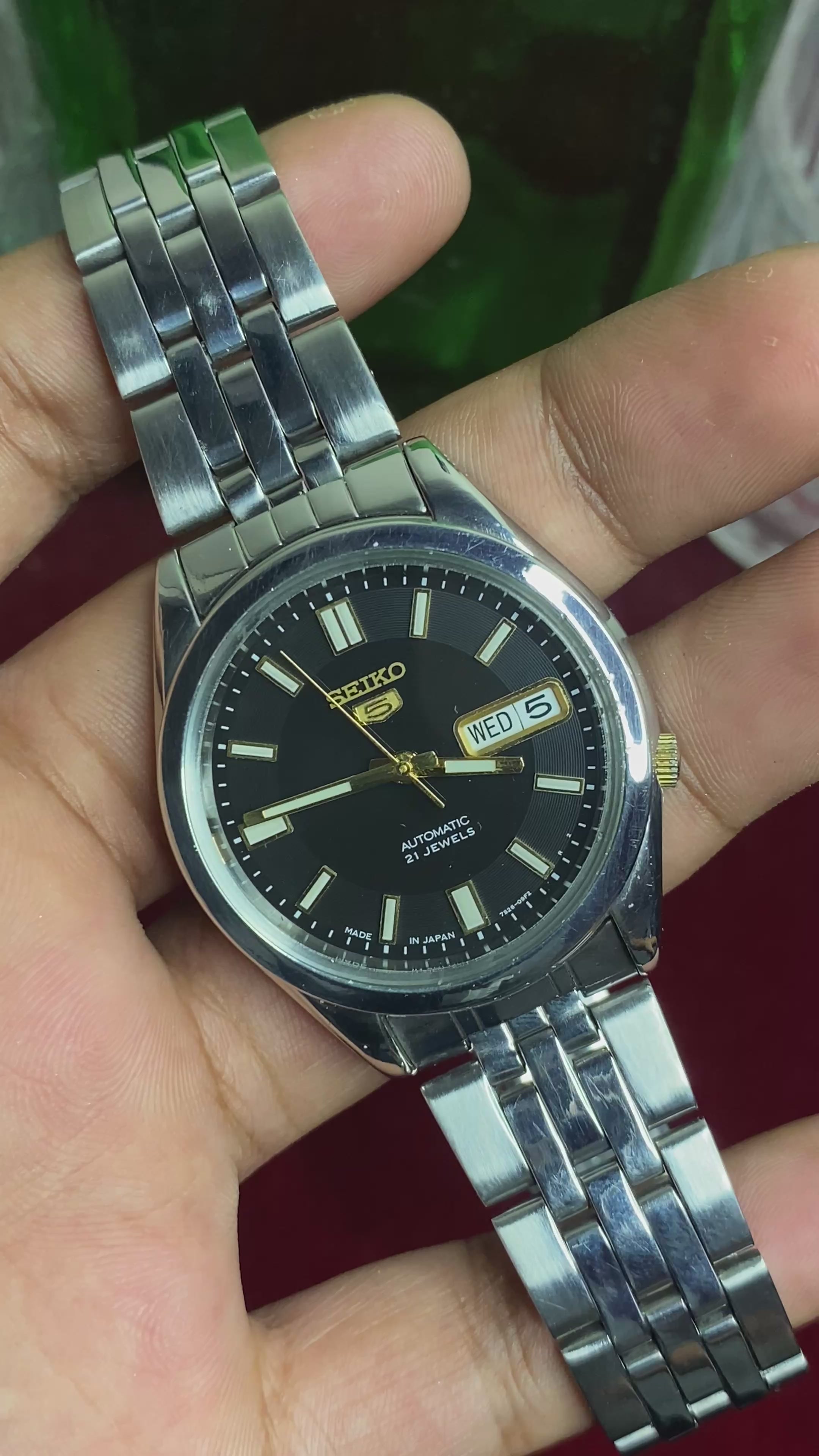 Seiko 5 SNKF67J1 Automatic — Black Sunburst Dial Watch with Exhibition Back | Ref 7S26-00X0.