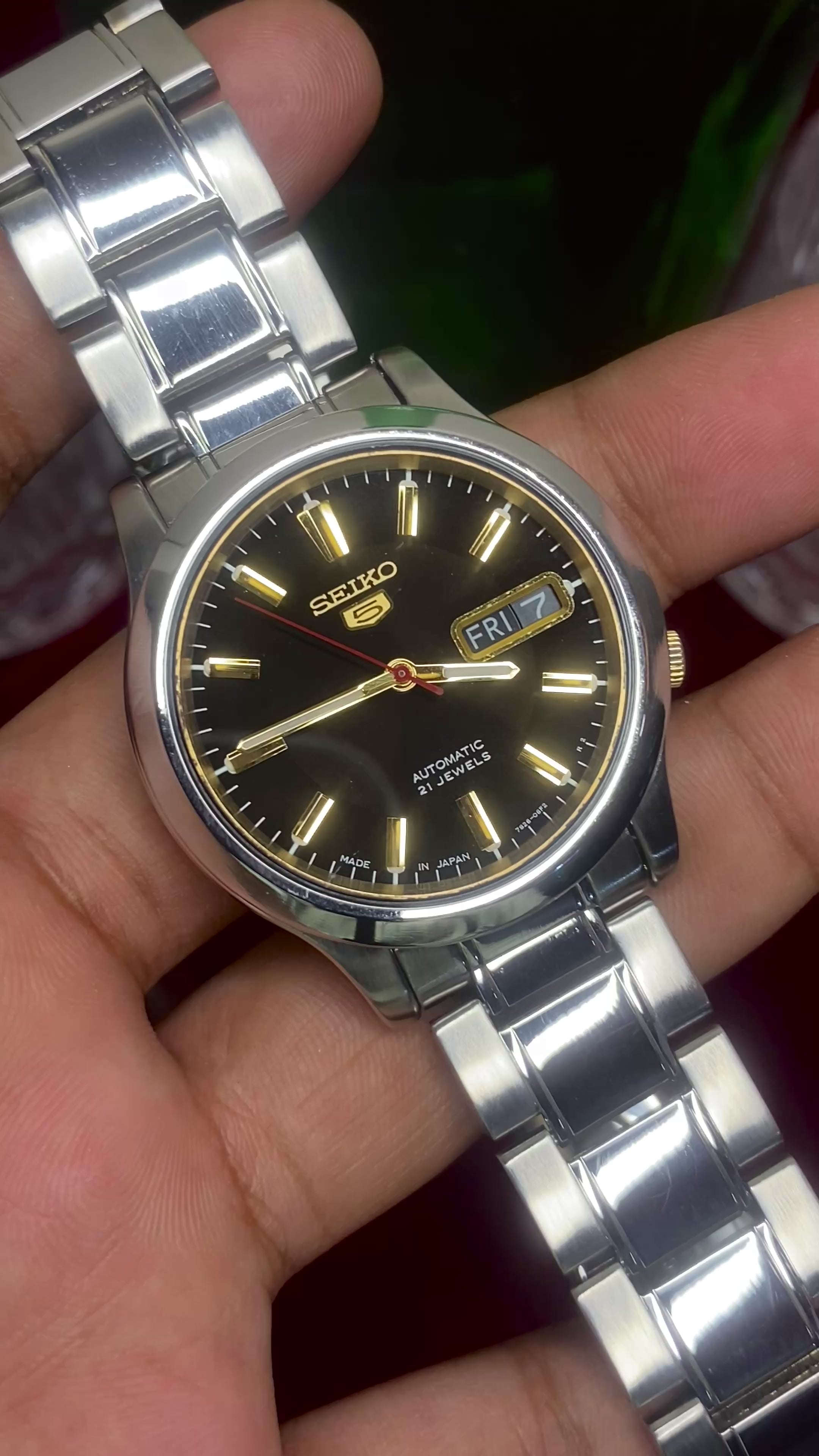 Seiko 5 Automatic — Black & Gold Dial Watch with Exhibition Back | Ref 7S26-01T0.